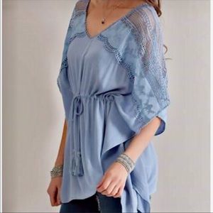 Blue poncho like blouse